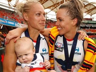 GOLD COAST, AUSTRALIA - MARCH 25: Erin Phillips (left) and Abbey Holmes of the Crows celebrate during the 2017 AFLW Grand Final match between the Brisbane Lions and the Adelaide Crows at Metricon Stadium on March 25, 2017 in Gold Coast, Australia. (Photo by Michael Willson/AFL Media/Getty Images)