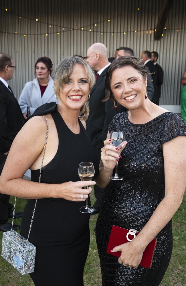 Erika Missingham (left) and Stacey Warrener at LifeFlight Toowoomba Gala at The Goods Shed. Picture: Kevin Farmer