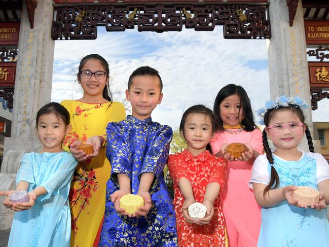 With the Australian Chinese Teo-Chew Association dancers Krystal Truong, Katie Nguyen, Alistair Tran, Lily Nguyen, Julie Nguyen and Audrey Tran at the Freedom Plaza, Cabramatta 12 September 2017. Picture: Simon Bullard.