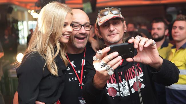 Emma, MG and fan Chris Barclay, from North Ryde. Picture: Tim Clapin