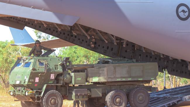 A US Marine Corp HIMARS Rocket Launcher unloads from an RAAF C-17A Globemaster III for a joint training exercise between the USMC and the ADF at Bradshaw Training Ground. Picture: Glenn Campbell