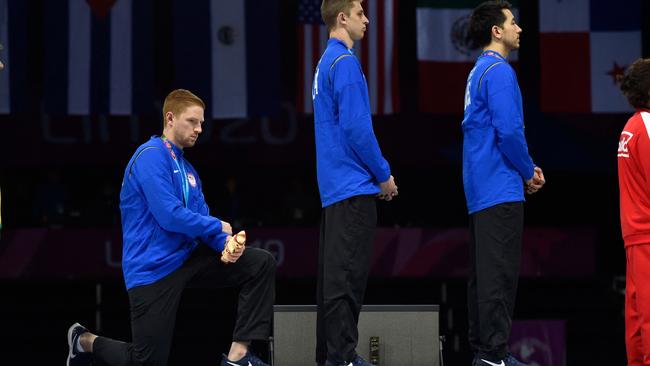 US fencer Race Imboden takes a knee at the 2019 Pan American Games