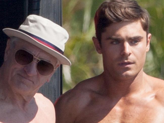 UK CLIENTS MUST CREDIT: AKM-GSI ONLY Zac Efron and Robert De Niro strip for a flex off on the set of 'Dirty Grandpa' in Tybee, Georgia. Pictured: Zac Efron and Robert De Niro Ref: SPL1013185 300415 Picture by: AKM-GSI / Splash News