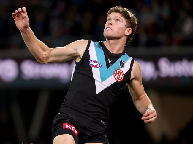 ADELAIDE, AUSTRALIA - JULY 08: Mitch Georgiades of the Power flies during the 2021 AFL Round 17 match between the Port Adelaide Power and the Melbourne Demons at Adelaide Oval on July 8, 2021 in Adelaide, Australia. (Photo by James Elsby/AFL Photos via Getty Images)