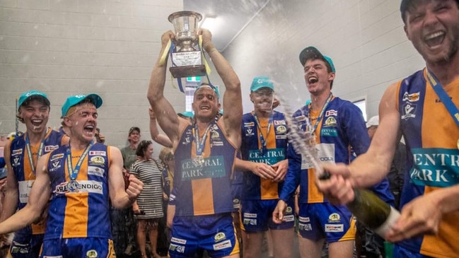 Golden Square celebrates in the change rooms after winning the Bendigo league title. Picture: SAA Imaging.