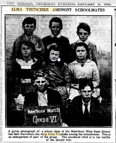 Alma Tirtschke (centre) among some of her schoolmates.