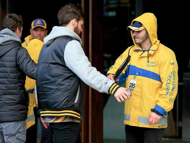 Patrons are checked by security. Picture: Mark Stewart