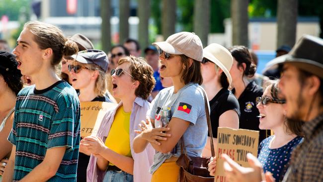 A crowd gathered out the front of the NT Parliament on Monday afternoon ahead of controversial youth bail law changes being pushed through. Picture: Che Chorley