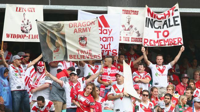 Dragons supporters cheer during the clash against the Rabbitohs at the Sydney Cricket Ground.