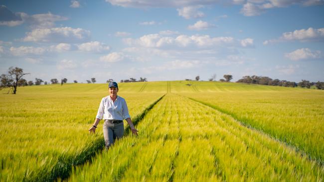 Liz O'Leary in a barley crop on Gindurra, at Canowindra. Picture: David Roma