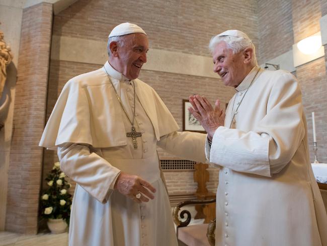 Pope Francis (L) and Pope emeritus Benedict XVI during a meeting in 2016. Picture: AFP