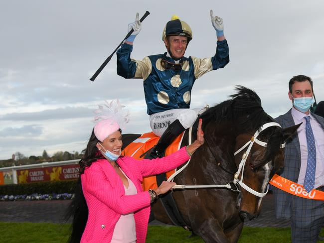 MELBOURNE, AUSTRALIA - SEPTEMBER 18: Daniel Moor riding Sierra Sue and trainer Natalie Young react after winning Race 8, the Neds Sir Rupert Clarke Stakes, during Melbourne Racing at Caulfield Racecourse on September 18, 2021 in Melbourne, Australia. (Photo by Vince Caligiuri/Getty Images)