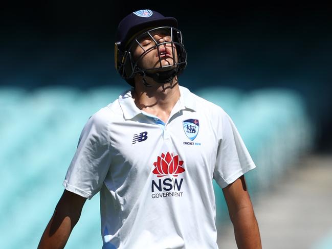 SYDNEY, AUSTRALIA - FEBRUARY 19: Sam Konstas of the Blues walks off the field after been dismissed by Scott Boland of Victoria during the Sheffield Shield match between New South Wales Blues and Victoria at Sydney Cricket Ground on February 19, 2025 in Sydney, Australia. (Photo by Jason McCawley/Getty Images)