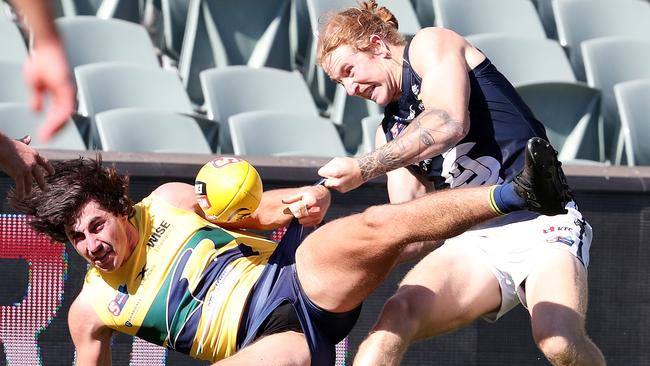 Beau McCreery tackles Eagle Lachie Jones in the preliminary final. Picture: Sarah Reed