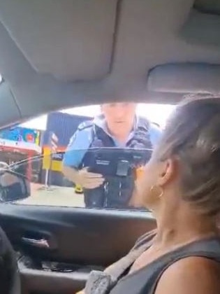 The stubborn woman has been pulled from her car during a traffic stop in Coffs Harbour after refusing to recognise police authority. Picture: Twitter