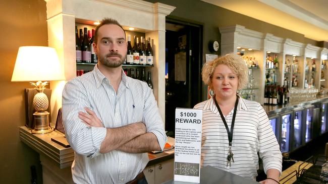 Hotel Mosman is offering a $1000 reward to catch the “herpes” graffiti vandal. Licensee Peter Crocker with Leana Mynx. Picture: Adam Ward