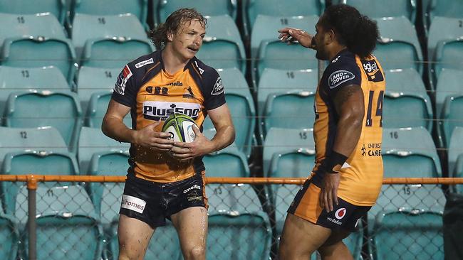 Joe Powell and Solomone Kata celebrate a Brumbies try against the Rebels in their Round 6 Super Rugby AU game. Picture: Getty Images