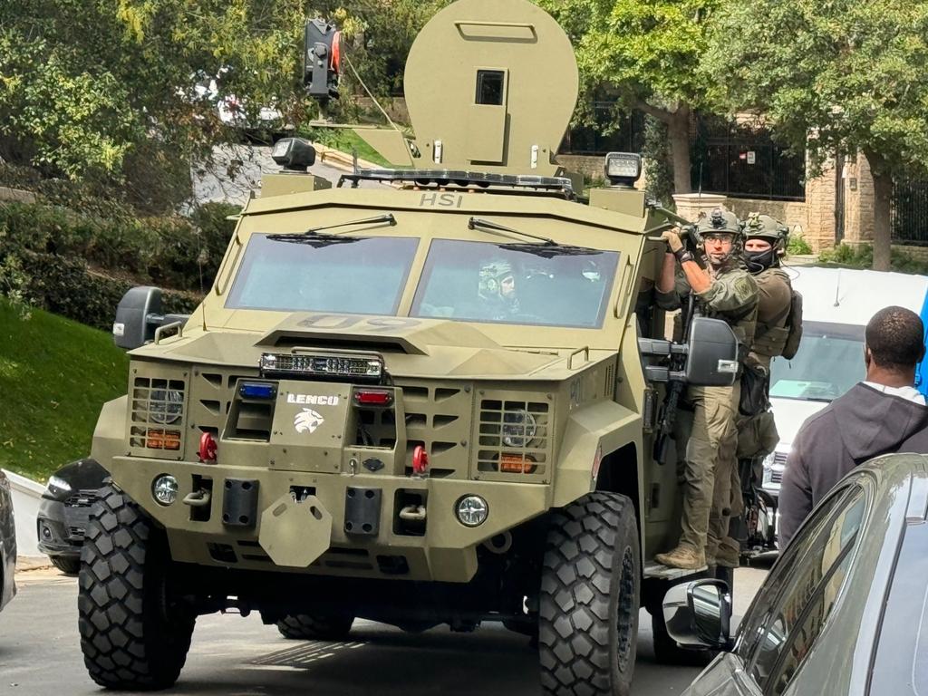 Members of the Homeland Security raid team were photographed arriving at Diddy’s Los Angeles mansion. Picture: The Hollywood JR / BACKGRID