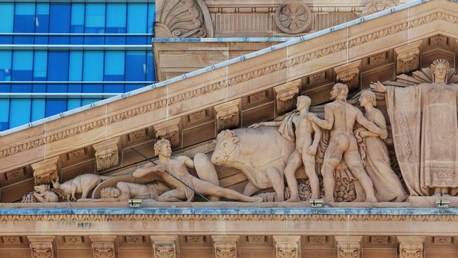 The Progress of Civilisation in the State of Queensland by Daphne Mayo on City Hall in King George Square, Brisbane CBD. Picture: AAP/Claudia Baxter