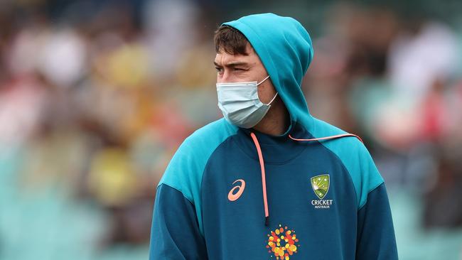 A masked-up Matt Renshaw looks on during day two of the SCG Test. Picture: Getty