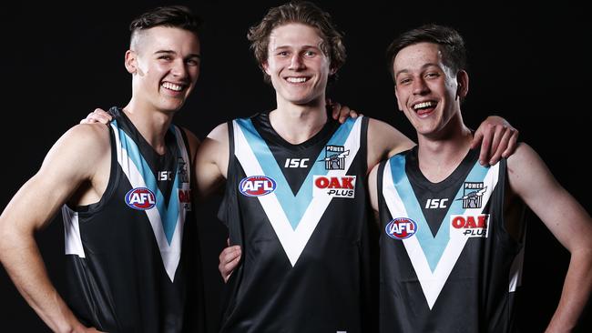 Connor Rozee, Xavier Duursma and Zak Butters of the Power. Picture: AAP Image/Daniel Pockett