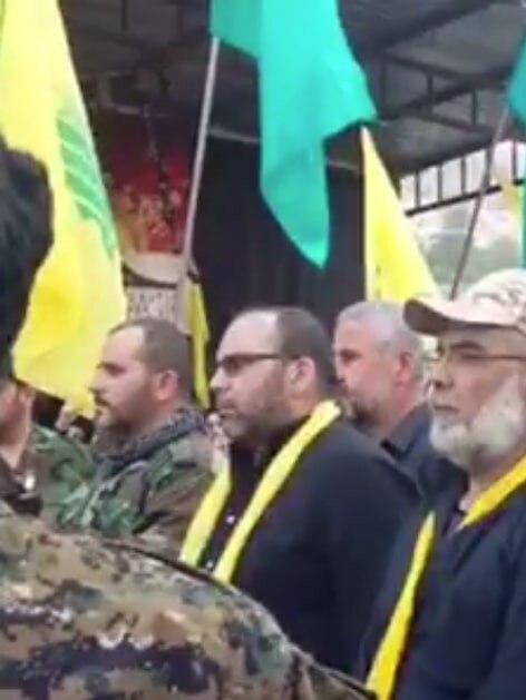 Al-Mabarrat director Yacoub Hammoud (centre) at the funeral of his brother, Abbas Hussein Hammoud who died fighting for Hezbollah in Syria.