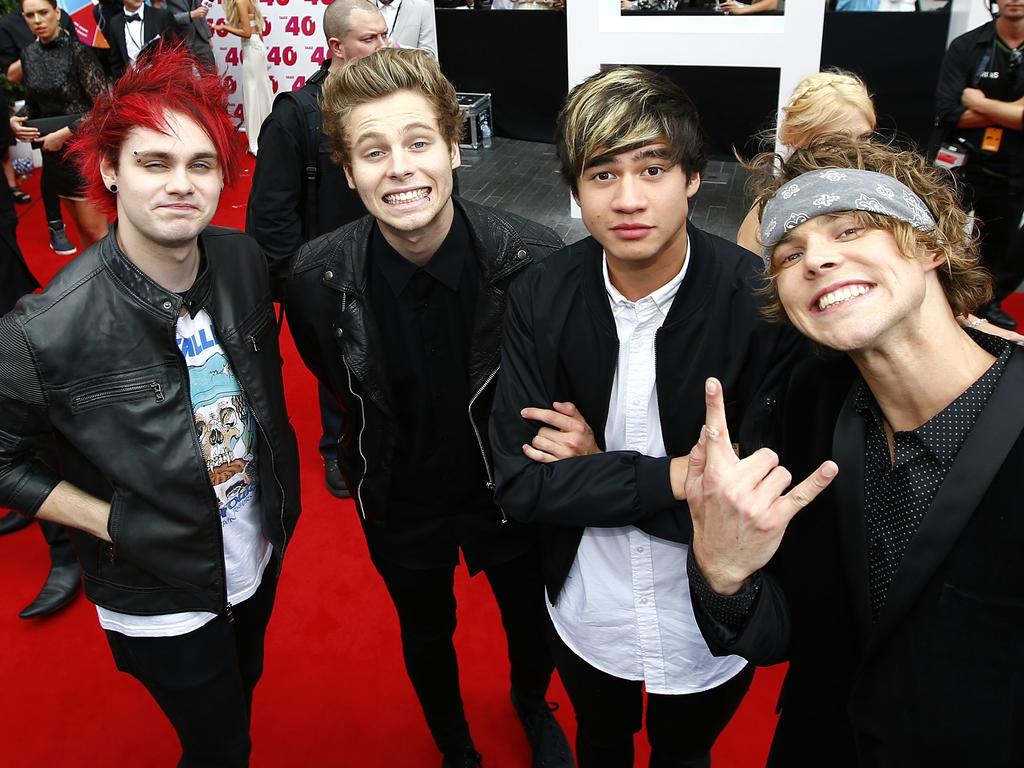 5 Seconds of Summer arrive on the red carpet at the ARIA Awards 2014 in Sydney, Australia. Picture: Bradley Hunter