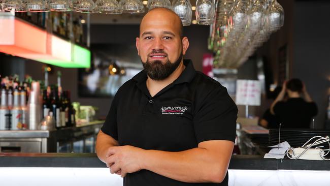 Restaurant manager Ramie Sitto is behind Stuart Ayres. Picture: Newscorp Daily Telegraph/ Gaye Gerard