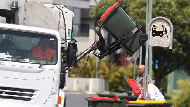 Garbage trucks picking up bins in the Randwick council area on Thursday morning. picture John Grainger