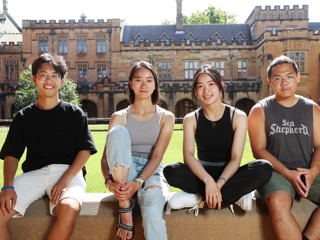 2/1/23: International students An Po-Ru, Yingyi Zhang, Szu-Yen Lee and Yiping Qiao at Sydney University talking about new migration data indicating that here will be a huge bounce-back in the numbers of international students and other migrants entering the country after the easing of covid-related restrictions. John Feder/The Australian.
