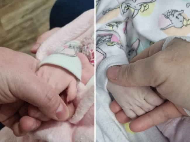 Nikki Hufton holds the hand of her stillborn daughter, Sophie. Picture: Supplied