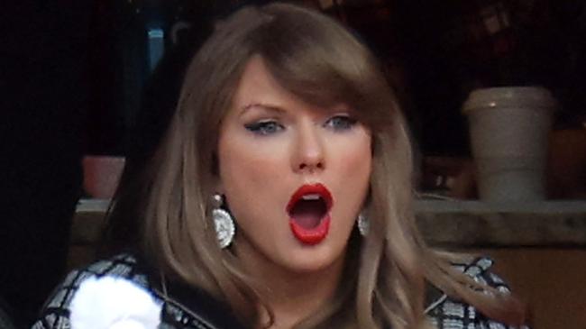 KANSAS CITY, MISSOURI - JANUARY 18: Singer-songwriter Taylor Swift reacts during the first quarter in the AFC Divisional Playoff between the Houston Texans and the Kansas City Chiefs at GEHA Field at Arrowhead Stadium on January 18, 2025 in Kansas City, Missouri.   Jamie Squire/Getty Images/AFP (Photo by JAMIE SQUIRE / GETTY IMAGES NORTH AMERICA / Getty Images via AFP)