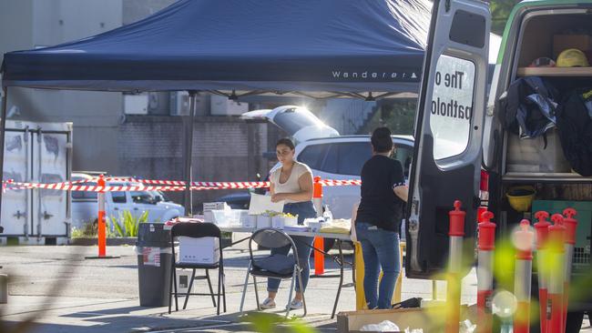 A woman is seen setting up a COVID-19 pop-up testing drive-through station in Avalon on December 18, 2020 in Sydney, Australia. Picture: Jenny Evans/Getty Images