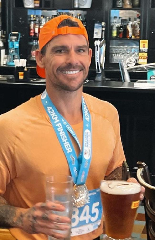 Caine Eckstein celebrates completing the Gold Coast Marathon and World Record at Waxy’s Irish pub in Surfers Paradise.