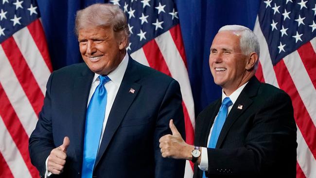 US President Donald Trump and vice-president Mike Pence give a thumbs up after speaking during the first day of the Republican National Convention. Picture: AFP