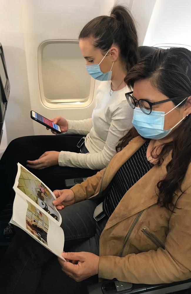 Qantas passengers wearing face masks to adhere to the airline’s COVID-19 rules. Picture: Qantas