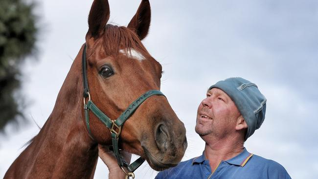 Trainer Bryce Stanaway with Crafty Cruiser at his Torquay training base. Picture: Colleen Petch.