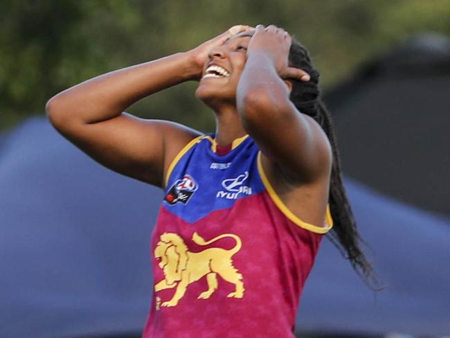 Sabrina Frederick-Traub (centre) of the Lions misses a goal during the Round 2 AFLW match between the Brisbane Lions and the Western Bulldogs at the South Pine Sports Complex in Brisbane, Sunday, February 11, 2018. (AAP Image/Glenn Hunt) NO ARCHIVING, EDITORIAL USE ONLY