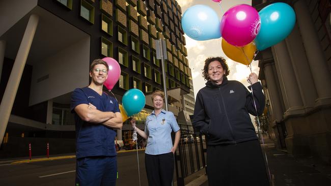 Royal Hobart Hospital nurses (L-R) Jacob Roberts, Pip Rice and Nancy Arnold celebrating International Nurses Day. Picture: LUKE BOWDEN