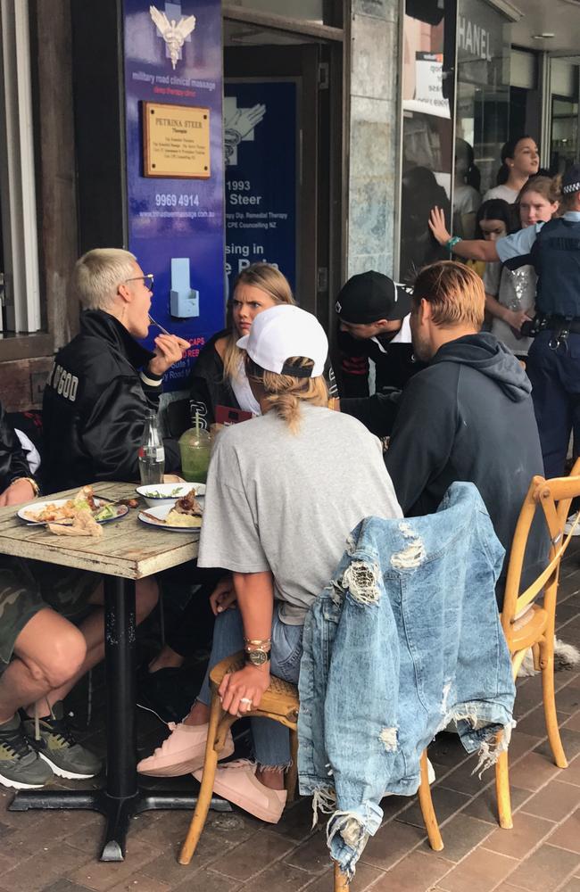 A crowd watches on as Justin Bieber eats at Chargrill Charlie's Mosman. Source: Supplied.