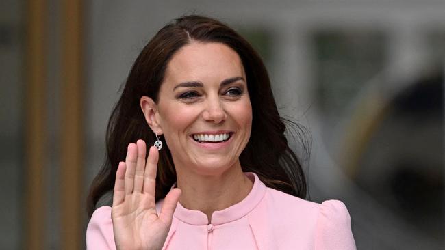 (FILES) Britain's Catherine, Princess of Wales waves as she leaves from the Young V&A in east London on June 28, 2023, after attending it's official opening it following its renaming from the V&A Museum of Childhood. The Princess of Wales is facing up to two weeks in hospital after undergoing successful abdominal surgery, Kensington Palace announced on January 17, 2024. (Photo by JUSTIN TALLIS / AFP)