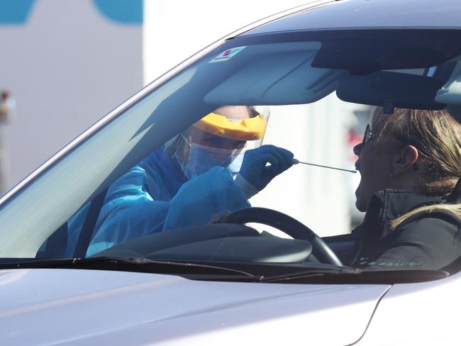 Members of the public getting a Covid-19 test at a drive through testing site Caloundra. Picture Lachie Millard