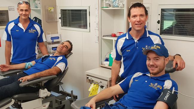 Jim's Pool Care Sydney East's Robert Sara (Randwick), Chris Stephandellis (Woollahra), franchisor Brad Papworth and Mark Turner (Hurstville) donate blood in Coogee. Supplied pic.