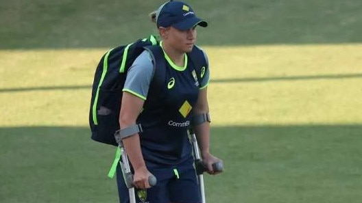 Australian captain Alyssa Healy on crutches.