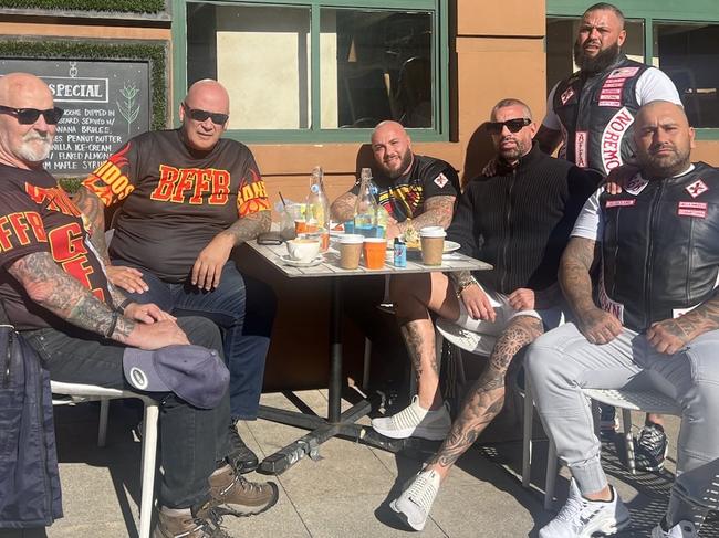 Bandidos national president Tony Vartianen (second from left) and senior member Grey Norman with former Bandido turned Hells Angel Jason Fahey and two members of the Hells Angels after his defection to the club this week.