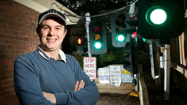 Ryan Purdie restores and donates traffic lights to kinders. Picture: Hamish Blair