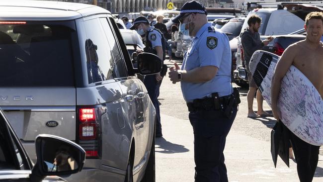 Police conduct public health order compliance checks at Bondi Beach in mid-2021. Picture: Getty