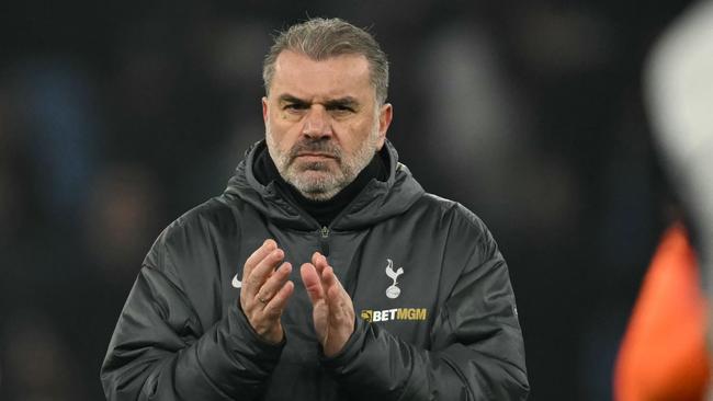 Tottenham Hotspur's Greek-Australian Head Coach Ange Postecoglou applauds fans on the pitch after the English FA Cup fourth round football match between Aston Villa and Tottenham Hotspur at Villa Park in Birmingham, central England on February 9, 2025. Villa won the game 2-1. (Photo by JUSTIN TALLIS / AFP) / RESTRICTED TO EDITORIAL USE. No use with unauthorized audio, video, data, fixture lists, club/league logos or 'live' services. Online in-match use limited to 120 images. An additional 40 images may be used in extra time. No video emulation. Social media in-match use limited to 120 images. An additional 40 images may be used in extra time. No use in betting publications, games or single club/league/player publications. /