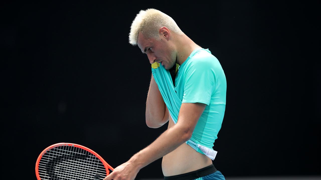 Bernard Tomic of Australia looks dejected following his match against Roman Safiullin of Russia. Picture: Graham Denholm