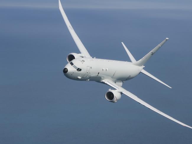 A RAAF P-8A Poseidon supports sea trials for the NUSHIP Hobart in the Gulf St Vincent off the coast of Adelaide. *** Local Caption *** Royal Australian Air Force (RAAF) F/A-18A/B Hornet aircraft and P-8A Poseidon aircraft have conducted low level, fast flying operations over the Gulf St Vincent in support of the sea acceptance trials of NUSHIP Hobart. The trials were conducted in standard Defence restricted airspace to test the ship’s systems in a maritime environment. The sea acceptance trials represent the beginning of the formal ship acceptance process in the lead up to delivery of the first Hobart Class Destroyer, NUSHIP Hobart, later this year (2017).